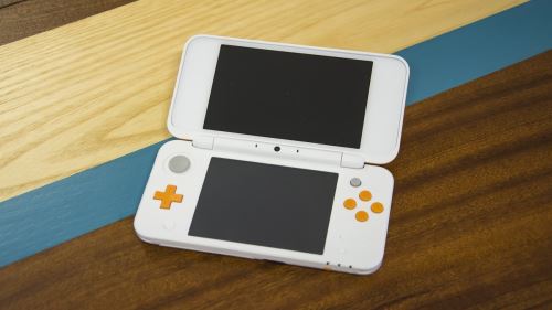 New Nintendo 2DS XL - žltobielej (estetická vada) + originálne balenie