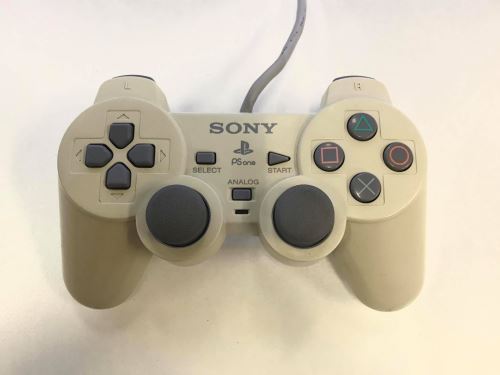 [PS1] Drôtový Ovládač Sony Dualshock - biely (žltkastý) (estetická vada)